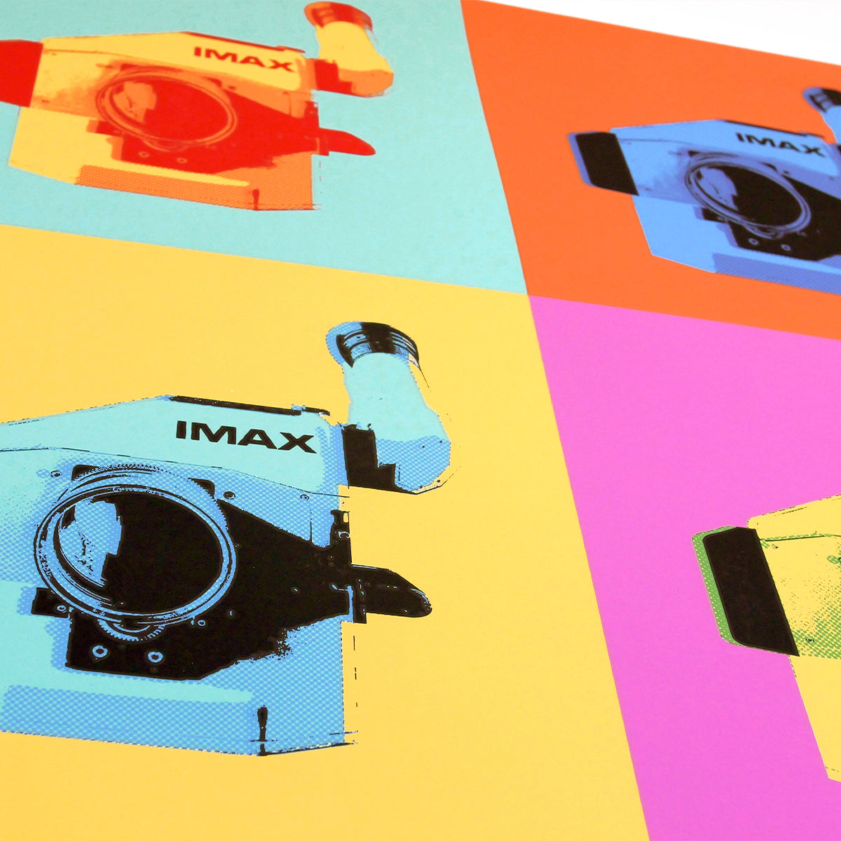 A close-up of a multicolored poster depicting IMAX film cameras placed in various colored boxes.