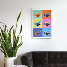 A framed multicolored poster hanging on the wall, depicting several IMAX film cameras arranged in various colored boxes.