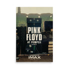 Poster artwork featuring musical equipment labeled Pink Floyd London on a stage with the Roman ruins of Pompeii in the background with poster text Pink Floyd at Pompeii MCMLXXII Experience it in IMAX.