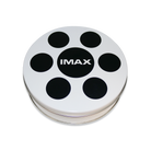 A sealed popcorn canister designed to resemble a film reel with an IMAX logo on the lid.