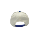Cream and royal blue cotton dad hat featuring embroidered IMAX outline logo on the front, curved blue brim, and adjustable back strap and embroidered “’67” detail on the side.