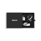 Three silver pins shaped like a director’s chair, an IMAX camera, and a clapper board in a small, black box with a white IMAX logo on the front.
