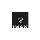 A silver and black pin in the shape of a Director’s chair used on set with the IMAX logo on a black, IMAX-branded backing card.