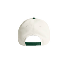 Cream and green cotton baseball style hat hat featuring embroidered IMAX outline logo on the front, curved green brim, and adjustable back strap and embroidered “’67” detail on the side.