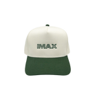 Cream and green cotton baseball style hat hat featuring embroidered IMAX outline logo on the front, curved green brim, and adjustable back strap and embroidered “’67” detail on the side.