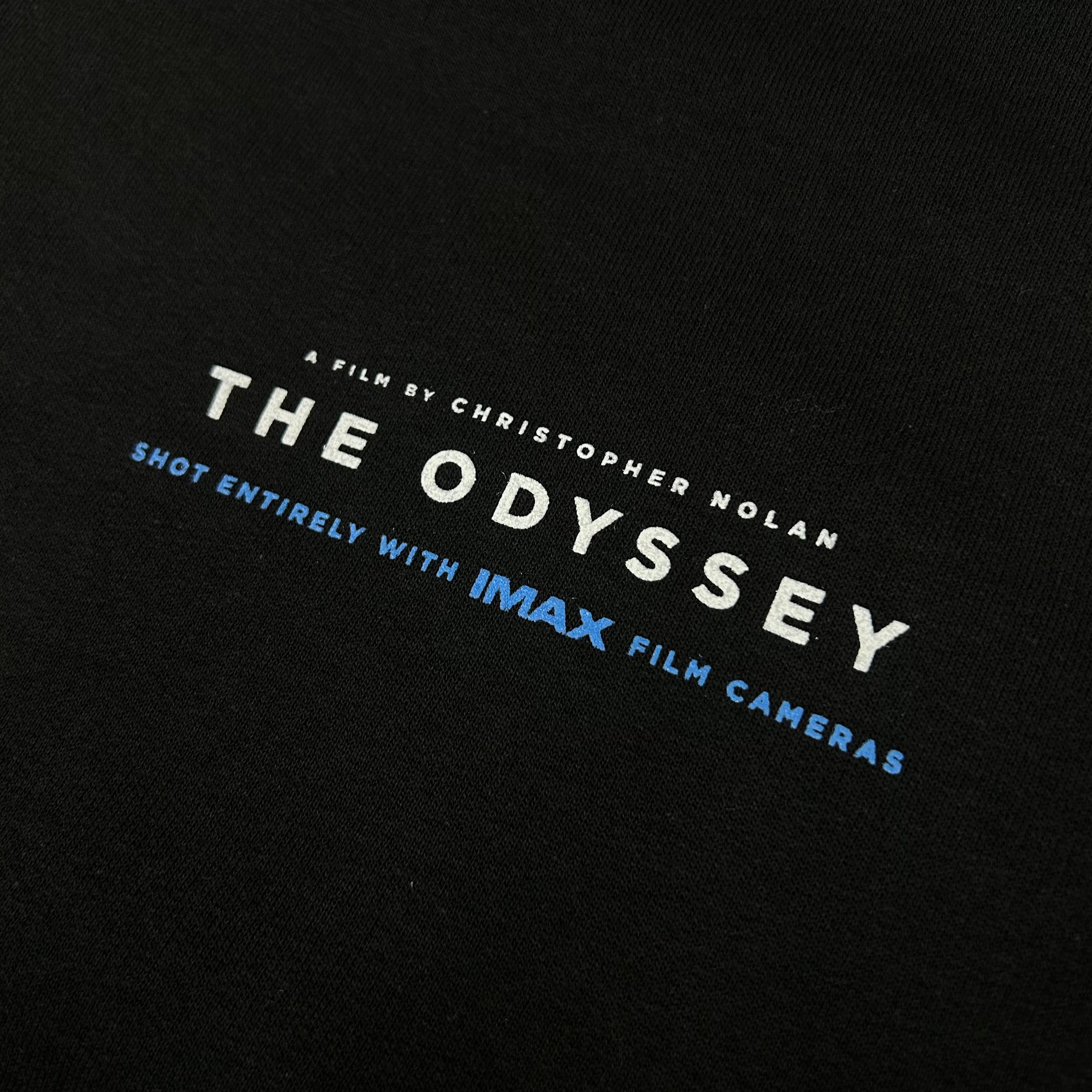 Black shirt with 'The Odyssey' text and IMAX branding