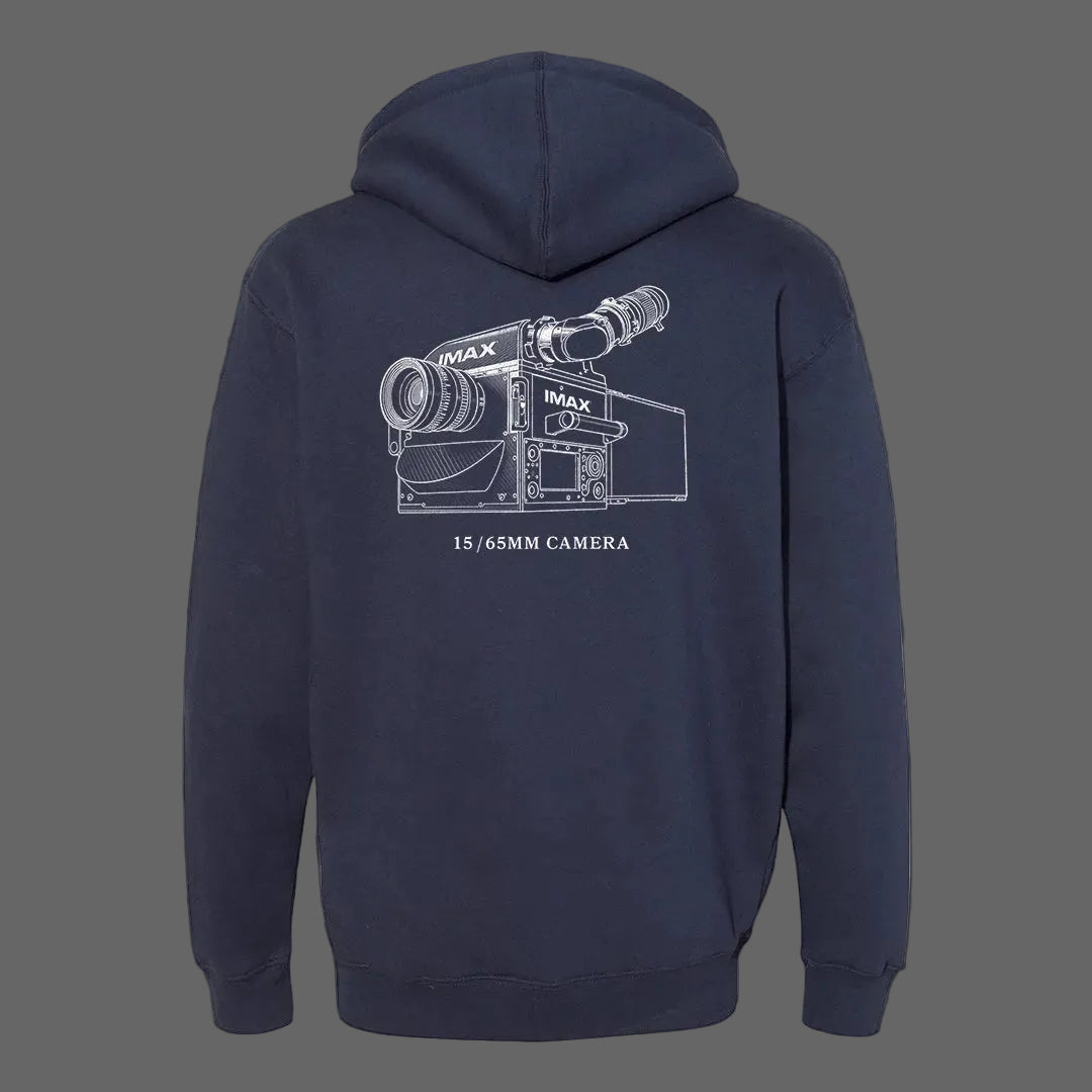 Navy blue IMAX hoodie with a white IMAX logo printed on the center chest in the front and a technical line-art illustration of the IMAX Keighley Film Camera on the back.