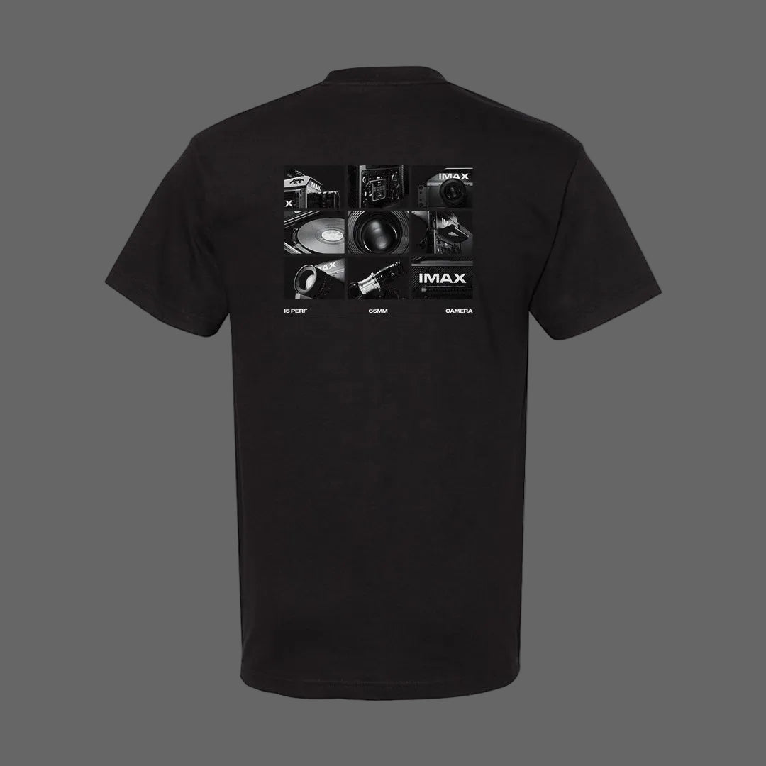Black IMAX T-shirt featuring a small outlined IMAX logo centered on the chest in the front and a collage graphic of the new IMAX 15/65mm camera and lens components on the back