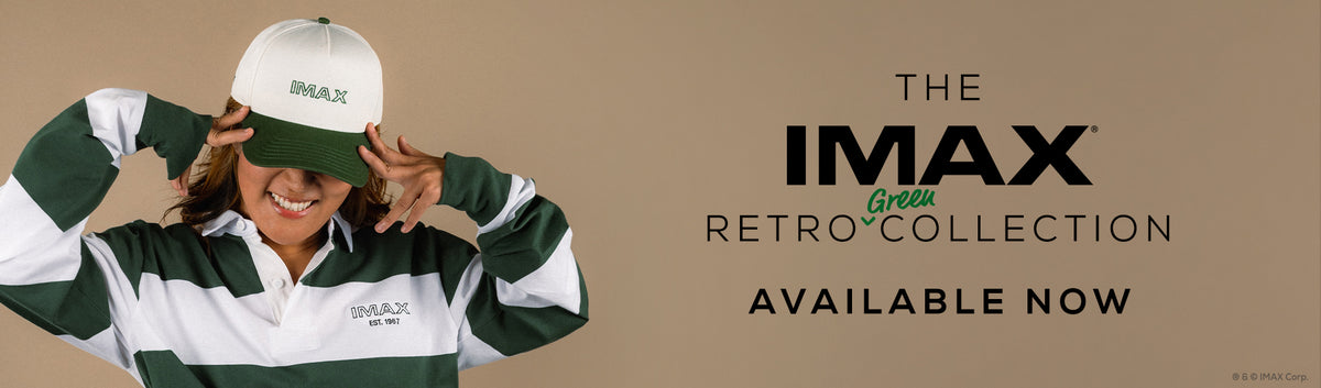 A promotional banner for The IMAX Retro Collection, featuring a woman on the left wearing a green and white striped long-sleeve shirt and a white cap with green trim and the IMAX logo. The right side has a solid tan background with text reading 'THE IMAX RETRO COLLECTION' and 'AVAILABLE NOW'.
