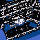 A festive black and blue holiday sweater featuring various camera-related logos, IMAX logo, with 3 pockets on the front and candy tucked in the pockets.