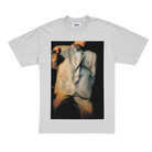 The front of a white T-shirt featuring an image from the documentary Stop Making Sense .