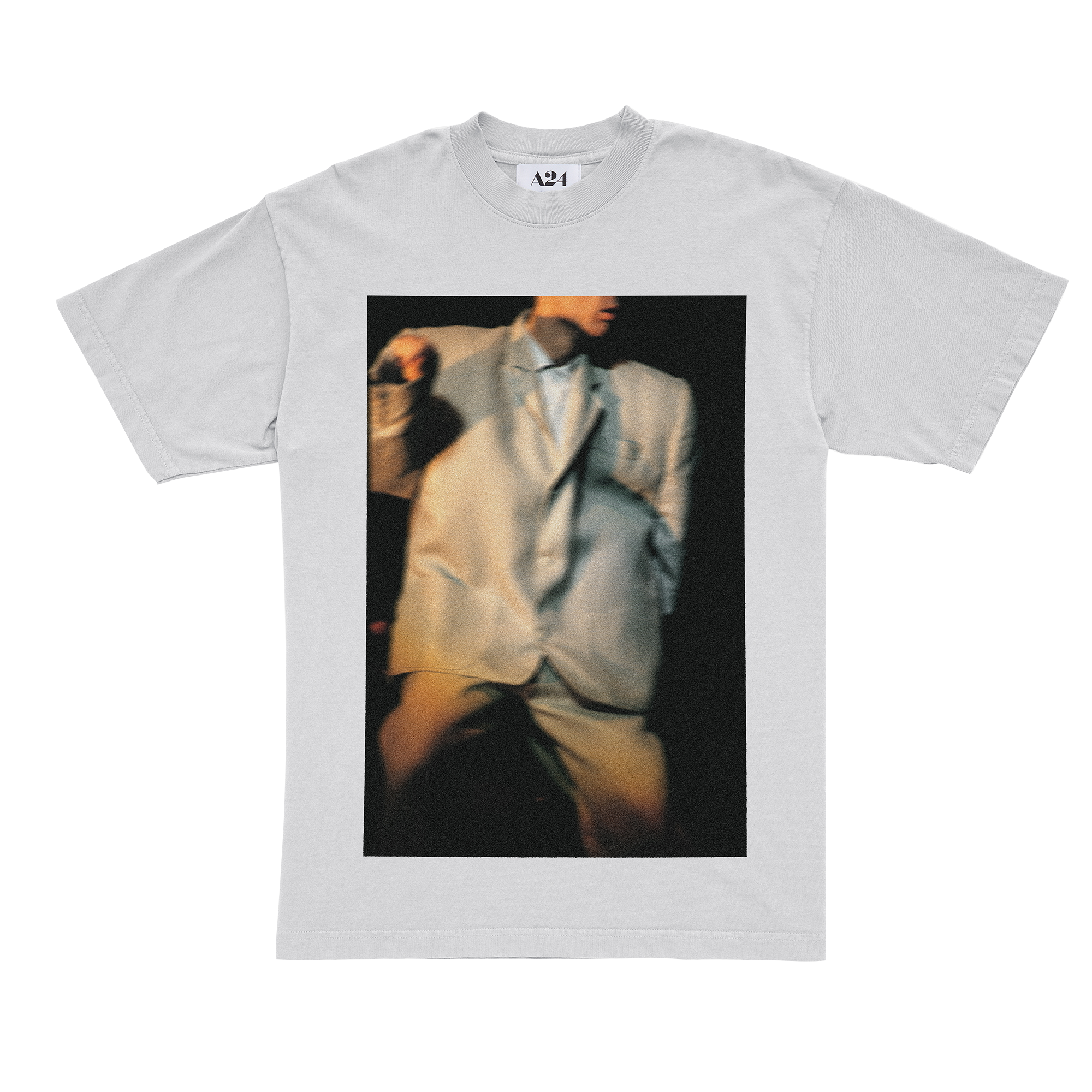 The front of a white T-shirt featuring an image from the documentary Stop Making Sense .