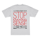 The back of a white T-shirt featuring a simplified version of the Stop Making Sense IMAX film poster, including the words Stop Making Sense in a very large and red font, as well as the IMAX and A24 logos.